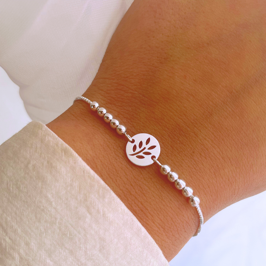 PULSERA AJUSTABLE CÍRCULO HOJITA Y ESFERAS