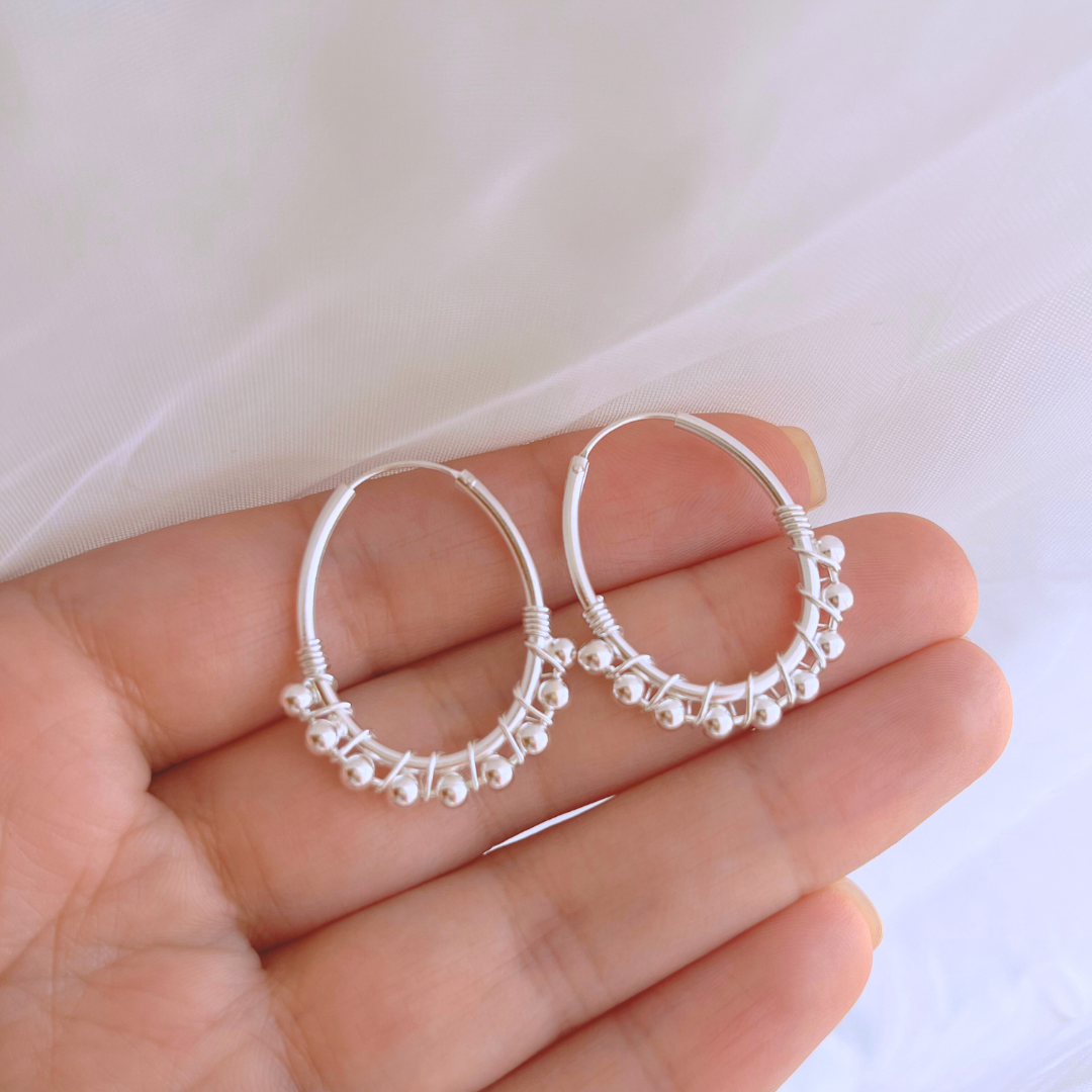 ARGOLLAS OVALADAS CON ESFERAS 20X30 MM
