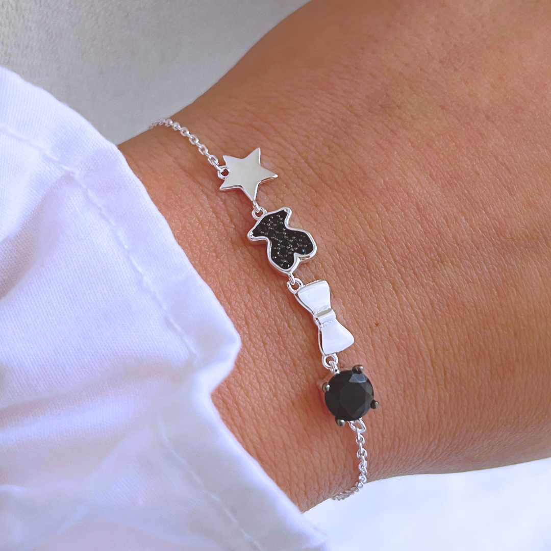 PULSERA ESTRELLAS, LAZO, OSITO Y CIRCÓN ONIX _ 17+3 CM