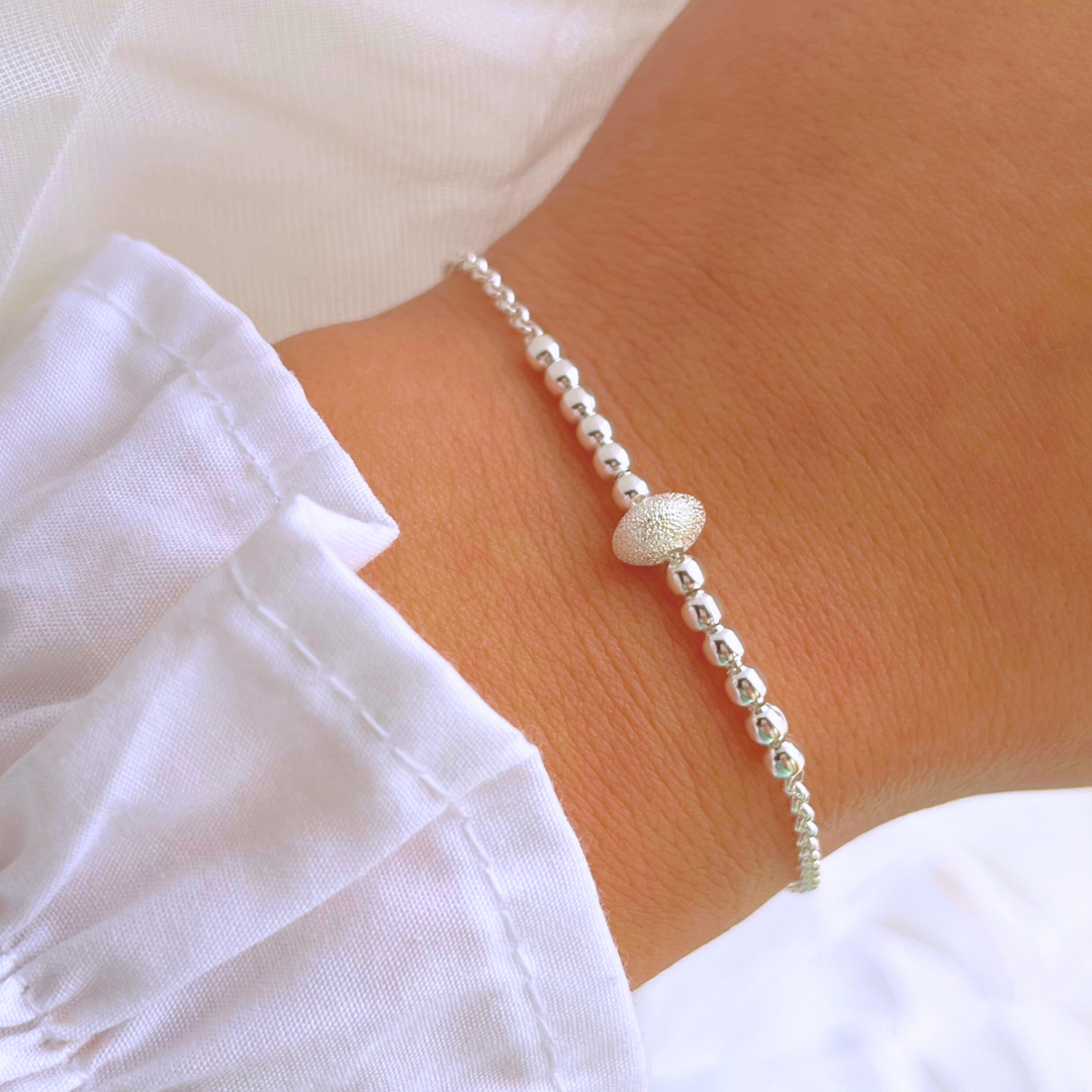 PULSERA ESFERAS CENTRAL SATINADA