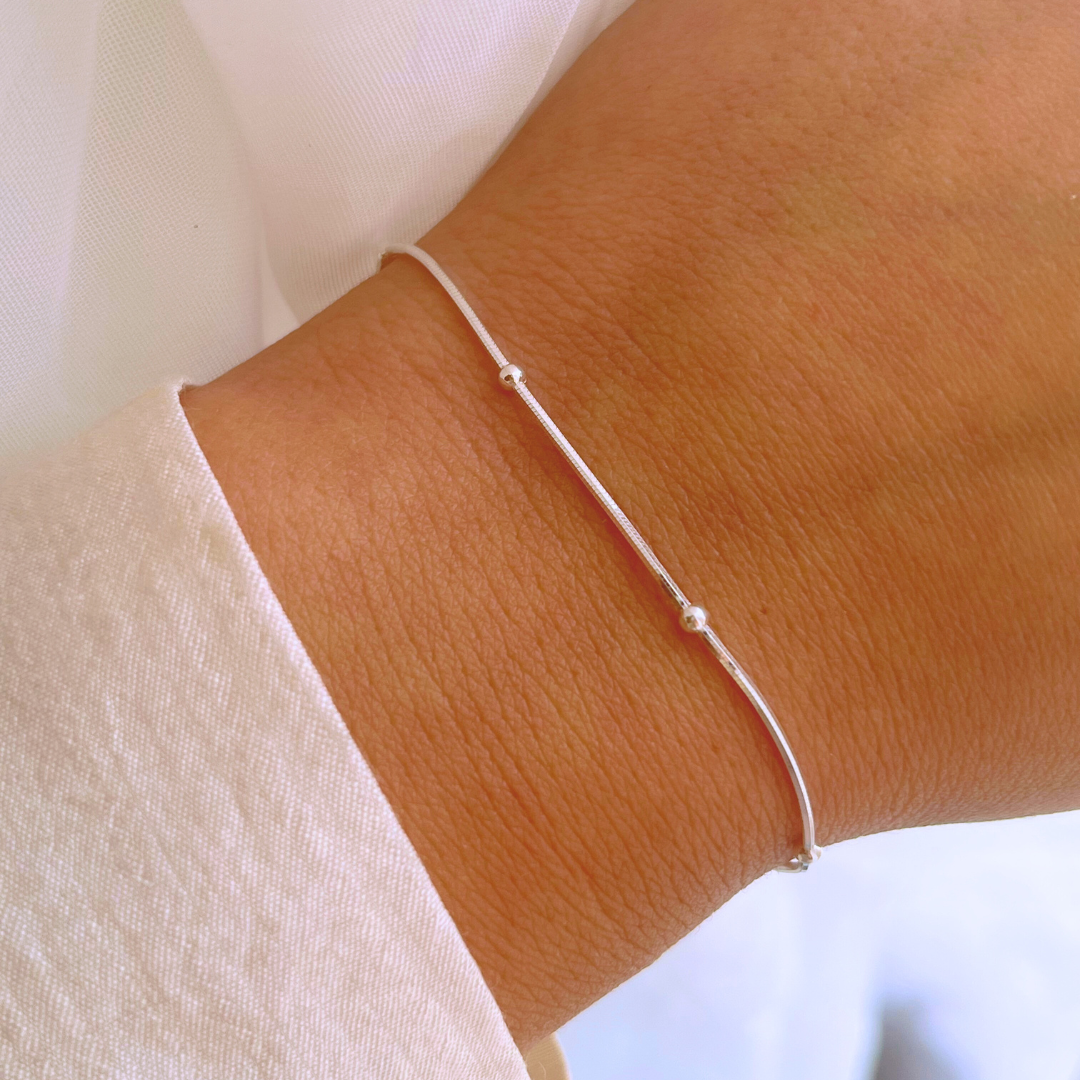 PULSERA COLA DE TOPO Y ESFERAS