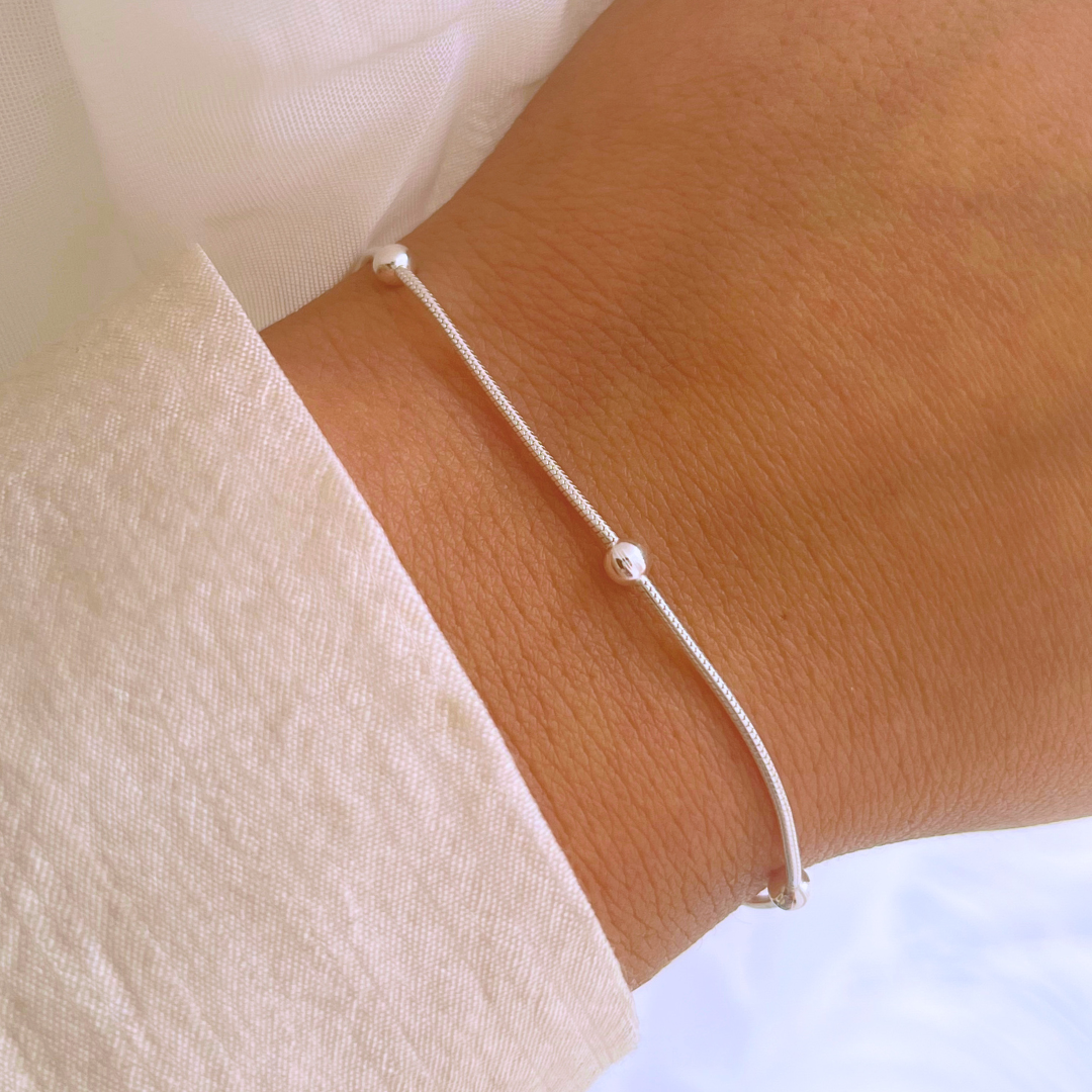 PULSERA COLA DE TOPO ESFERAS