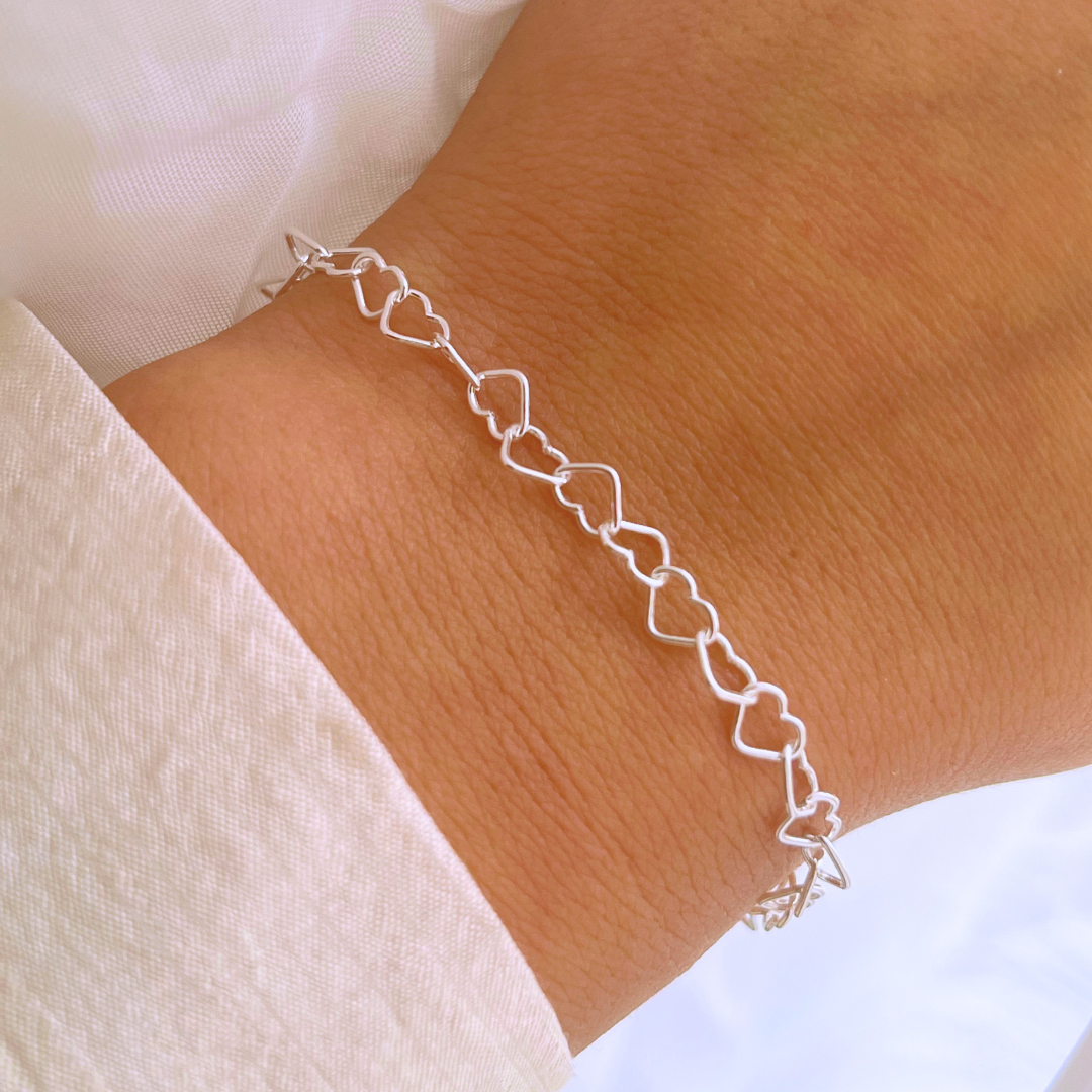 PULSERA CORAZONES ENTRLAZADOS