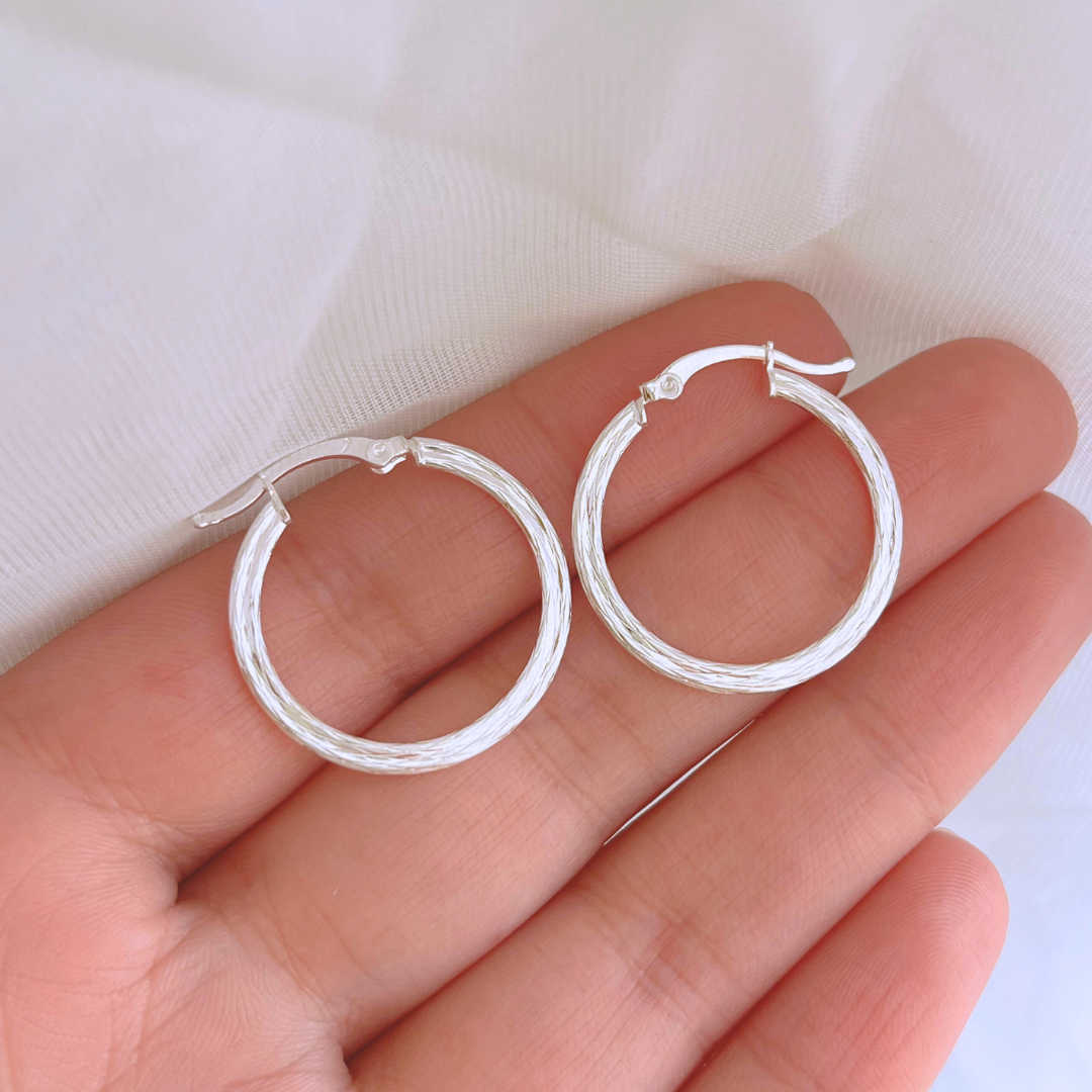 ARGOLLAS PLANAS TEXTURIZADAS CIERRE CRIOLLO 25 MM