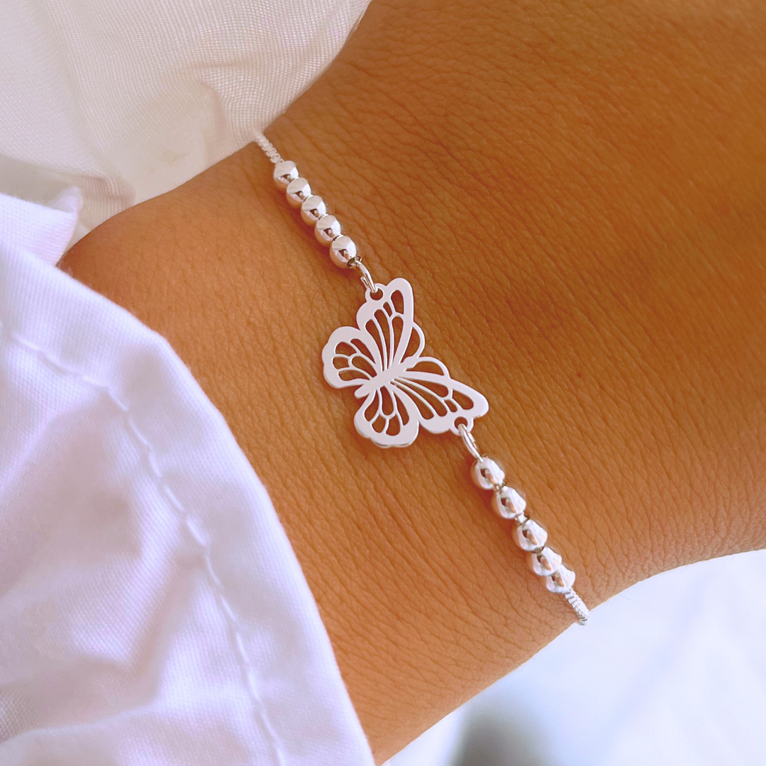 PULSERA AJUSTABLE MARIPOSA Y ESFERAS