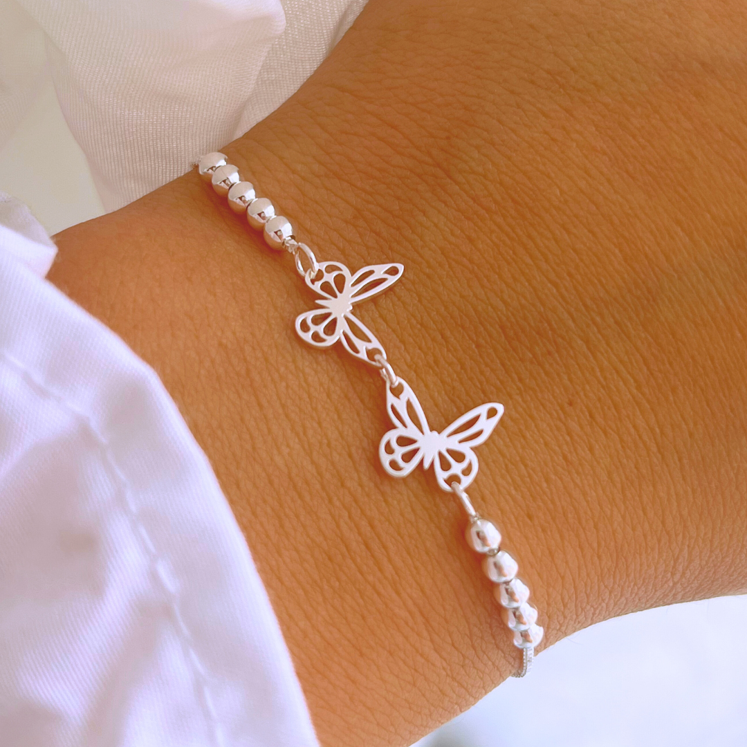PULSERA AJUSTABLE MARIPOSAS Y ESFERAS