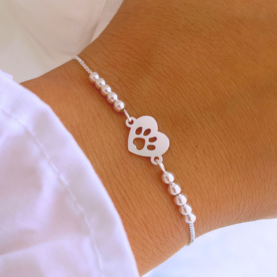 PULSERA AJUSTABLE CORAZÓN PATITA Y ESFERAS